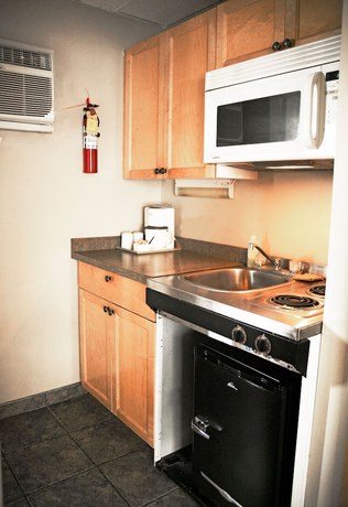 Imagen de la habitación del Hotel Ramada By Wyndham Quesnel. Foto 2