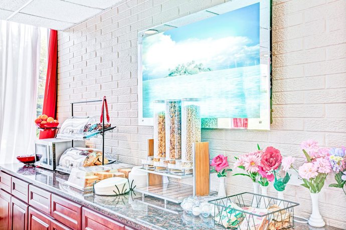 Imagen del bar/restaurante del Hotel Ramada By Wyndham Rockaway. Foto 4