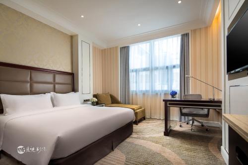Imagen de la habitación del Hotel Ramada By Wyndham Shanghai Pudong. Foto 4