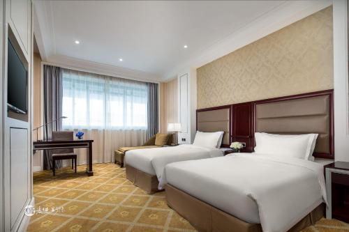Imagen de la habitación del Hotel Ramada By Wyndham Shanghai Pudong. Foto 6