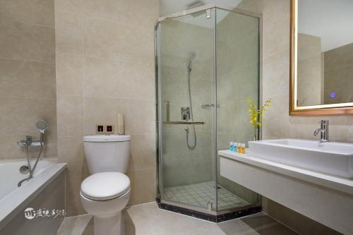 Imagen de la habitación del Hotel Ramada By Wyndham Shanghai Pudong. Foto 8