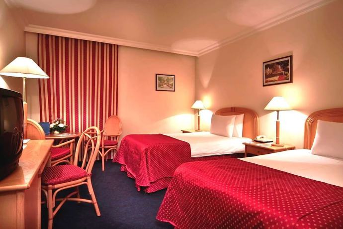 Imagen de la habitación del Hotel Ramada By Wyndham Sofia City Center. Foto 6