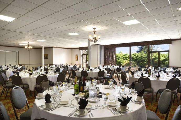 Imagen del bar/restaurante del Hotel Ramada By Wyndham Spokane Airport. Foto 4