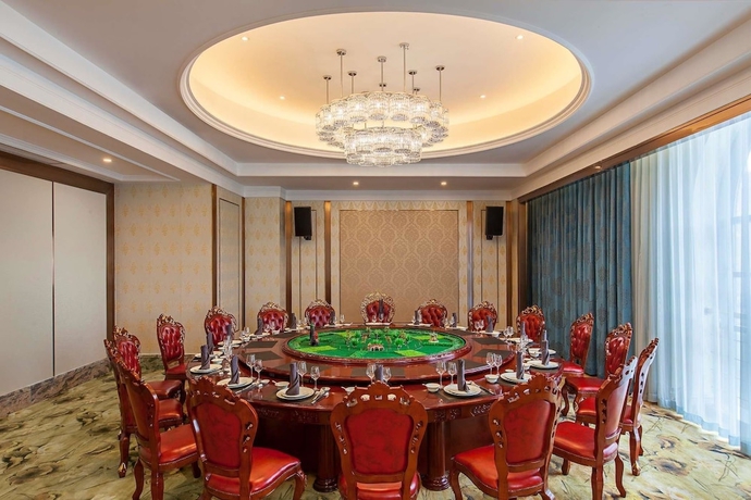 Imagen del bar/restaurante del Hotel Ramada By Wyndham Taixing. Foto 4