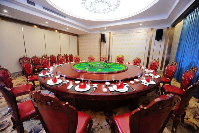 Imagen de los interiores del Hotel Ramada By Wyndham Taixing. Foto 16