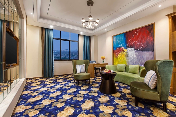 Imagen de la habitación del Hotel Ramada By Wyndham Taixing. Foto 10