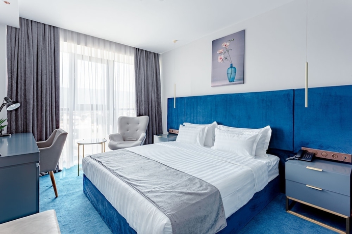 Imagen de la habitación del Hotel Ramada By Wyndham Tbilisi Old City. Foto 6