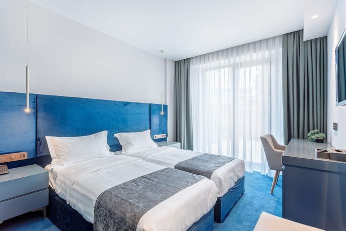Imagen de la habitación del Hotel Ramada By Wyndham Tbilisi Old City. Foto 8