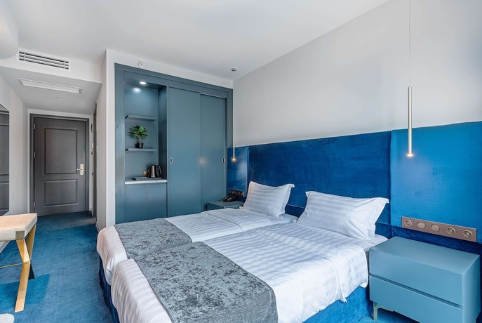Imagen de la habitación del Hotel Ramada By Wyndham Tbilisi Old City. Foto 9