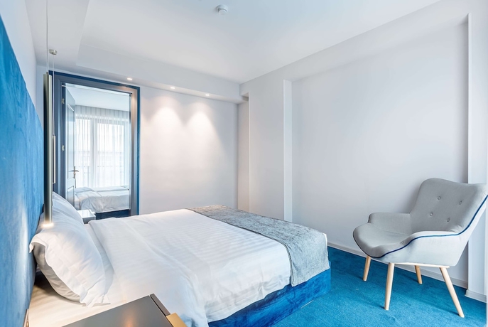 Imagen de la habitación del Hotel Ramada By Wyndham Tbilisi Old City. Foto 12