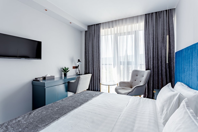 Imagen de la habitación del Hotel Ramada By Wyndham Tbilisi Old City. Foto 16