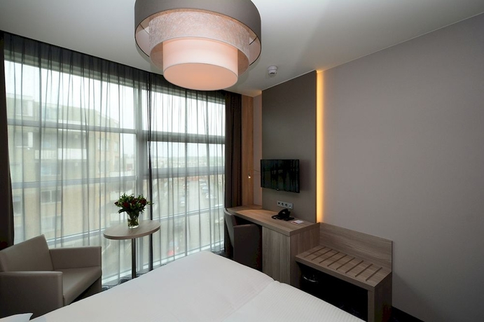 Imagen de la habitación del Hotel Ramada By Wyndham The Hague Scheveningen. Foto 6