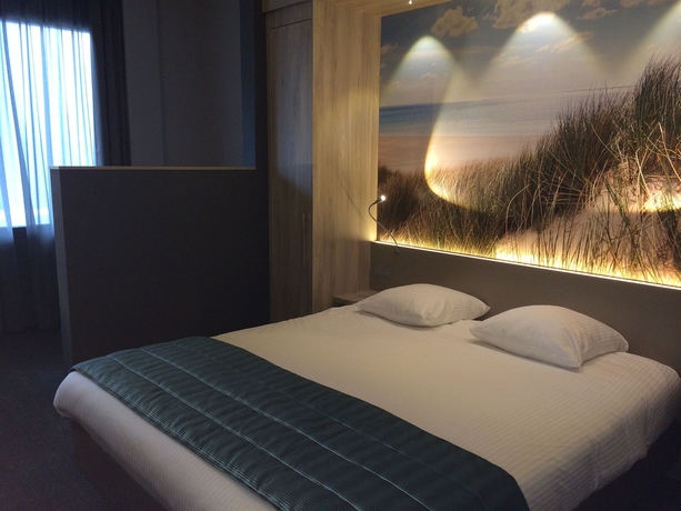 Imagen de la habitación del Hotel Ramada By Wyndham The Hague Scheveningen. Foto 11