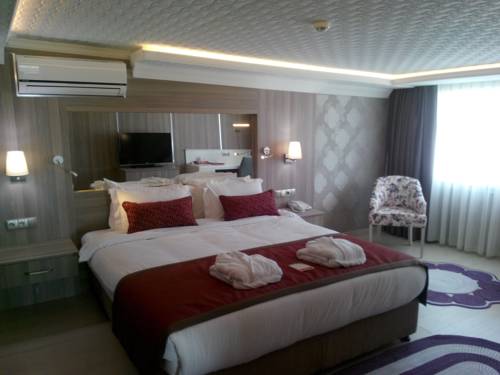 Imagen de la habitación del Hotel Ramada By Wyndham Usak. Foto 8