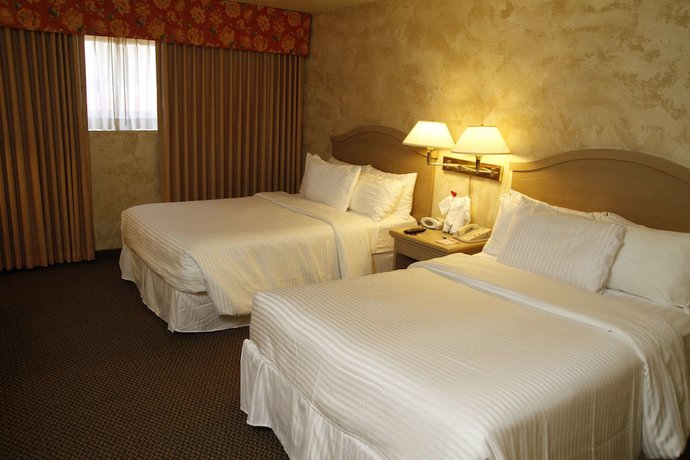 Imagen de la habitación del Hotel Ramada By Wyndham Viscount Suites Tucson East. Foto 3