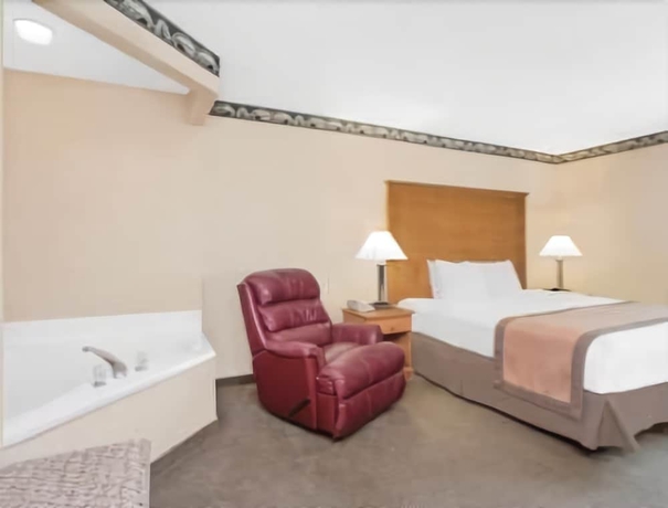 Imagen de la habitación del Hotel Ramada By Wyndham Waupaca. Foto 4