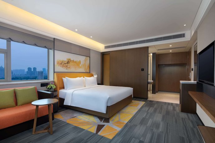 Imagen de la habitación del Hotel Ramada By Wyndham Wuhan Jiangan. Foto 4