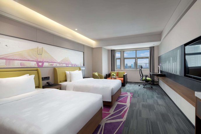 Imagen de la habitación del Hotel Ramada By Wyndham Wuhan Jiangan. Foto 5