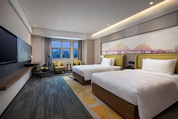Imagen de la habitación del Hotel Ramada By Wyndham Wuhan Jiangan. Foto 6