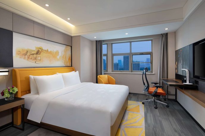 Imagen de la habitación del Hotel Ramada By Wyndham Wuhan Jiangan. Foto 8