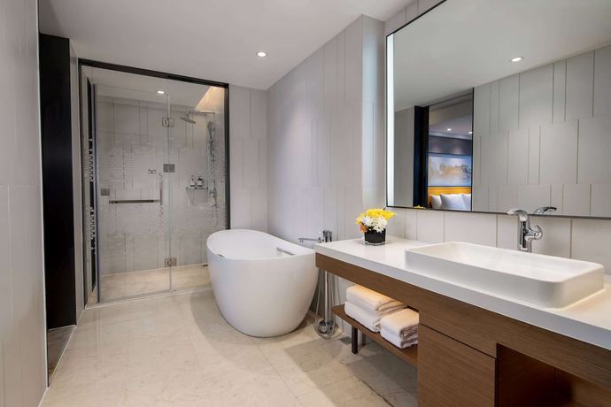 Imagen de la habitación del Hotel Ramada By Wyndham Wuhan Jiangan. Foto 10