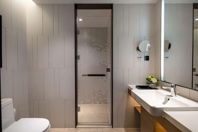 Imagen de la habitación del Hotel Ramada By Wyndham Wuhan Jiangan. Foto 11