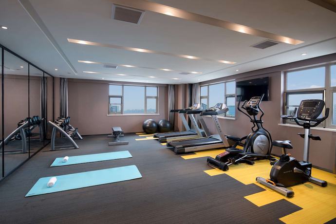 Imagen de los interiores del Hotel Ramada By Wyndham Wuhan Jiangan. Foto 16