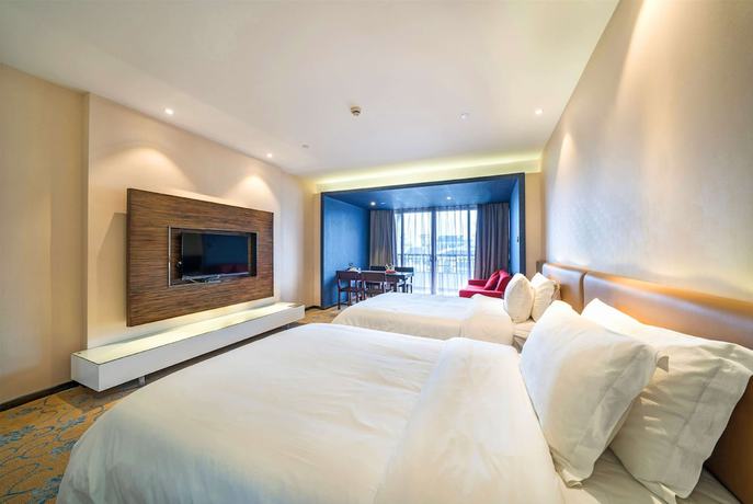 Imagen de la habitación del Hotel Ramada By Wyndham Wuyishan. Foto 6