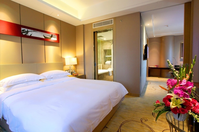 Imagen de la habitación del Hotel Ramada By Wyndham Xian Bell Tower. Foto 2