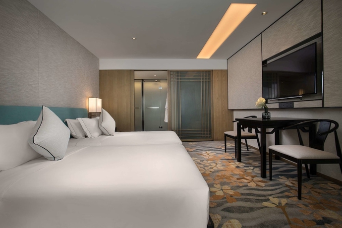 Imagen de la habitación del Hotel Ramada By Wyndham Zhenjiang City Center. Foto 7
