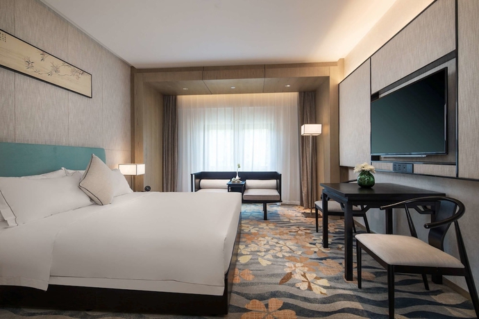 Imagen de la habitación del Hotel Ramada By Wyndham Zhenjiang City Center. Foto 9