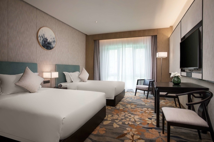 Imagen de la habitación del Hotel Ramada By Wyndham Zhenjiang City Center. Foto 10