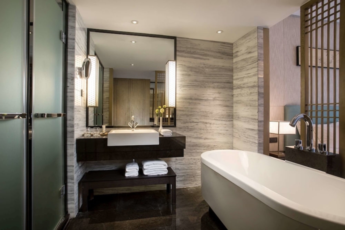 Imagen de la habitación del Hotel Ramada By Wyndham Zhenjiang City Center. Foto 11