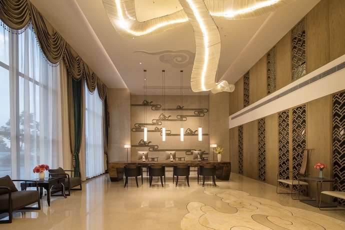 Imagen de los interiores del Hotel Ramada By Wyndham Zhenjiang City Center. Foto 15