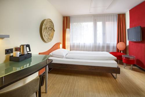 Imagen de la habitación del Hotel Ramada Du Parc Baden. Foto 7