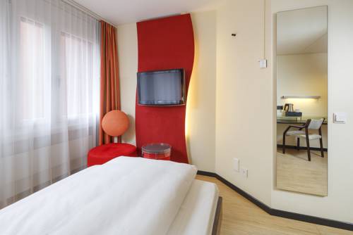 Imagen de la habitación del Hotel Ramada Du Parc Baden. Foto 8