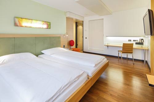 Imagen de la habitación del Hotel Ramada Du Parc Baden. Foto 11