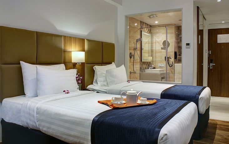 Imagen de la habitación del Hotel Ramada Encore By Wyndham Bangalore Domlur. Foto 13