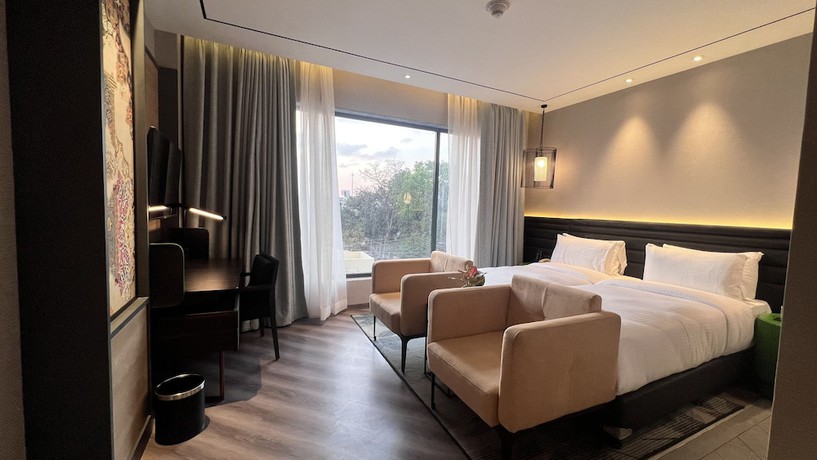 Imagen de la habitación del Hotel Ramada Encore By Wyndham Bareilly Civil Lines. Foto 7