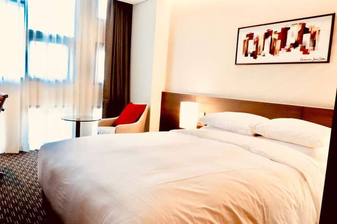 Imagen de la habitación del Hotel Ramada Encore By Wyndham Busan Station. Foto 6