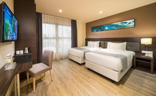 Imagen de la habitación del Hotel Ramada Encore By Wyndham Chinatown Kuala Lumpur. Foto 8