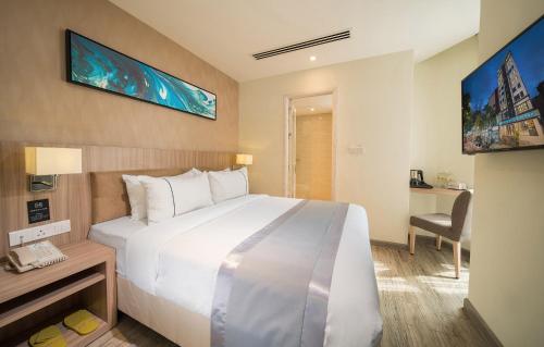 Imagen de la habitación del Hotel Ramada Encore By Wyndham Chinatown Kuala Lumpur. Foto 9