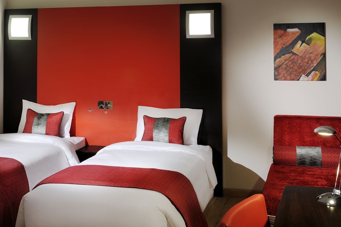 Imagen de la habitación del Hotel Ramada Encore By Wyndham Doha. Foto 6