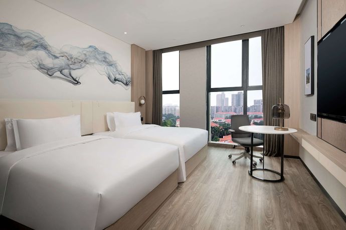 Imagen de la habitación del Hotel Ramada Encore By Wyndham Dongguan East. Foto 6