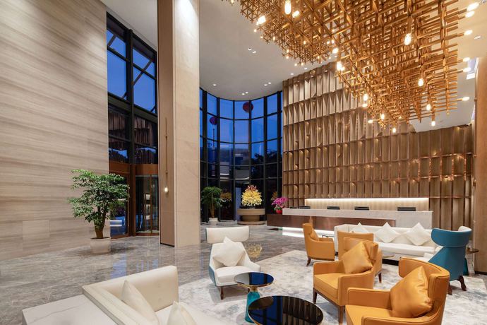 Imagen de los interiores del Hotel Ramada Encore By Wyndham Dongguan East. Foto 12
