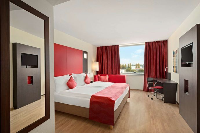 Imagen de la habitación del Hotel Ramada Encore By Wyndham Geneva. Foto 6