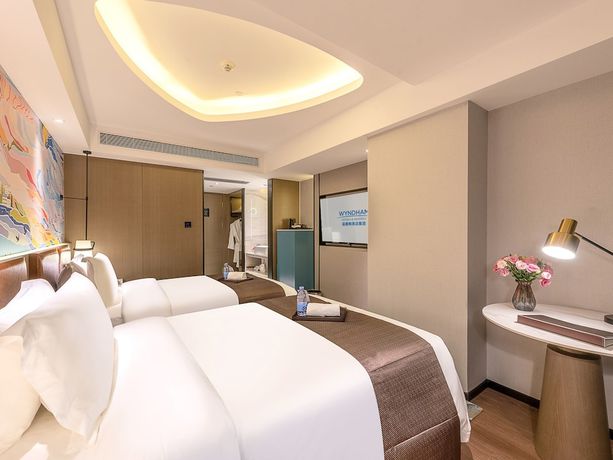 Imagen de la habitación del Hotel Ramada Encore By Wyndham Guangzhou Jiangnanxi. Foto 1
