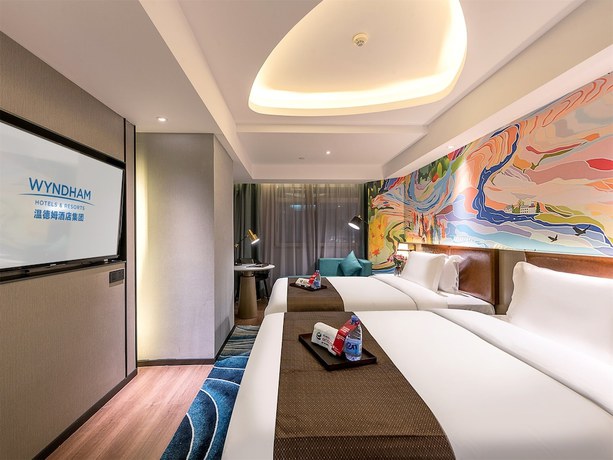 Imagen de la habitación del Hotel Ramada Encore By Wyndham Guangzhou Jiangnanxi. Foto 4