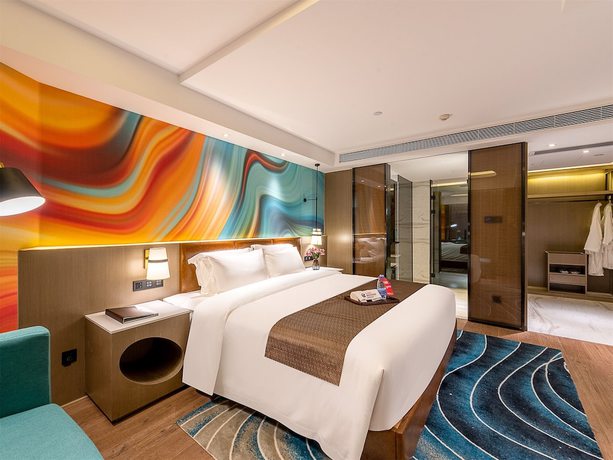Imagen de la habitación del Hotel Ramada Encore By Wyndham Guangzhou Jiangnanxi. Foto 13