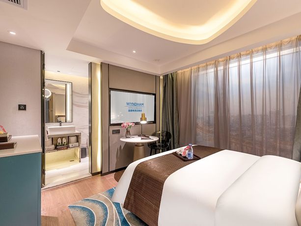 Imagen de la habitación del Hotel Ramada Encore By Wyndham Guangzhou Jiangnanxi. Foto 14